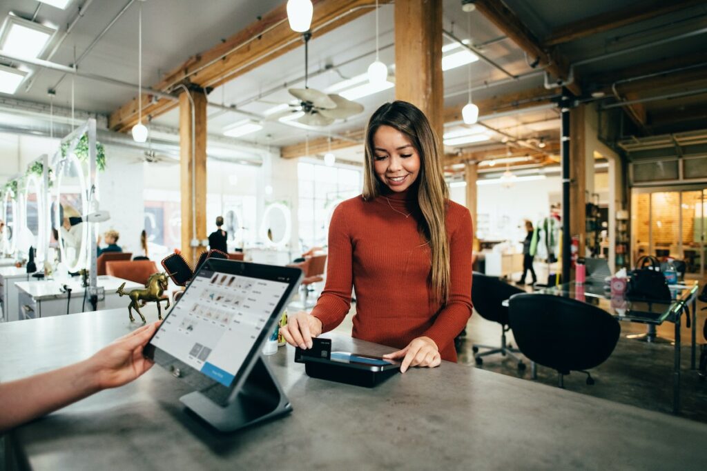 Woman paying at a store